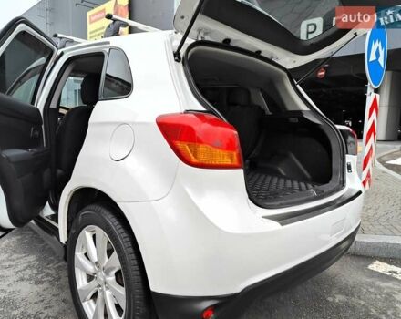 Белый Мицубиси Outlander Sport, объемом двигателя 2.4 л и пробегом 207 тыс. км за 9990 $, фото 14 на Automoto.ua