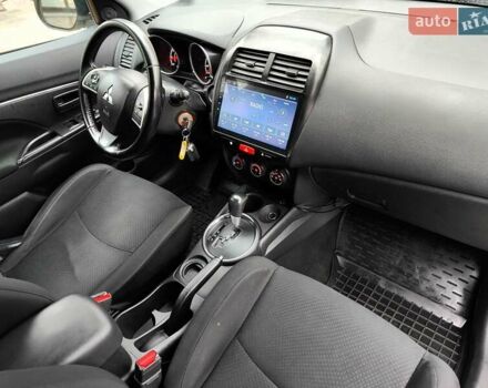 Белый Мицубиси Outlander Sport, объемом двигателя 2.4 л и пробегом 207 тыс. км за 10990 $, фото 48 на Automoto.ua