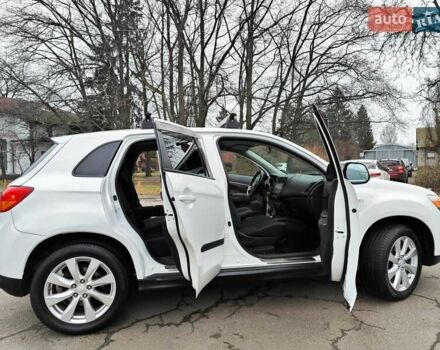 Белый Мицубиси Outlander Sport, объемом двигателя 2.4 л и пробегом 207 тыс. км за 9990 $, фото 20 на Automoto.ua