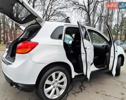 Белый Мицубиси Outlander Sport, объемом двигателя 2.4 л и пробегом 207 тыс. км за 9990 $, фото 17 на Automoto.ua