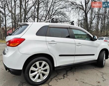 Белый Мицубиси Outlander Sport, объемом двигателя 2.4 л и пробегом 207 тыс. км за 9990 $, фото 18 на Automoto.ua
