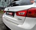 Белый Мицубиси Outlander Sport, объемом двигателя 2.4 л и пробегом 207 тыс. км за 9990 $, фото 17 на Automoto.ua