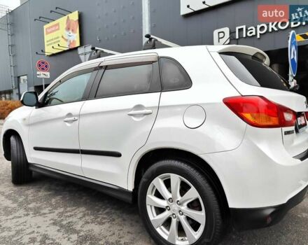 Белый Мицубиси Outlander Sport, объемом двигателя 2.4 л и пробегом 207 тыс. км за 9990 $, фото 13 на Automoto.ua