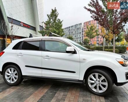 Белый Мицубиси Outlander Sport, объемом двигателя 2.4 л и пробегом 207 тыс. км за 10990 $, фото 27 на Automoto.ua