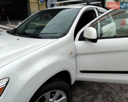 Белый Мицубиси Outlander Sport, объемом двигателя 2.4 л и пробегом 207 тыс. км за 9990 $, фото 3 на Automoto.ua
