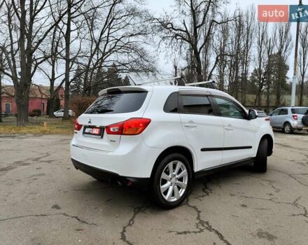 Белый Мицубиси Outlander Sport, объемом двигателя 2.4 л и пробегом 207 тыс. км за 9990 $, фото 19 на Automoto.ua