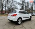 Белый Мицубиси Outlander Sport, объемом двигателя 2.4 л и пробегом 207 тыс. км за 9990 $, фото 19 на Automoto.ua
