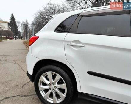 Белый Мицубиси Outlander Sport, объемом двигателя 2.4 л и пробегом 207 тыс. км за 9990 $, фото 25 на Automoto.ua