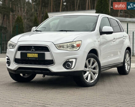 Белый Мицубиси Outlander Sport, объемом двигателя 2 л и пробегом 257 тыс. км за 10800 $, фото 1 на Automoto.ua