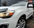 Белый Мицубиси Outlander Sport, объемом двигателя 2.4 л и пробегом 207 тыс. км за 10990 $, фото 2 на Automoto.ua