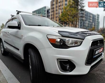 Белый Мицубиси Outlander Sport, объемом двигателя 2.4 л и пробегом 207 тыс. км за 9990 $, фото 32 на Automoto.ua