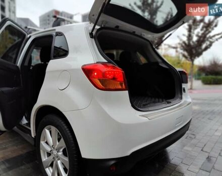 Белый Мицубиси Outlander Sport, объемом двигателя 2.4 л и пробегом 207 тыс. км за 10990 $, фото 14 на Automoto.ua