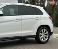 Белый Мицубиси Outlander Sport, объемом двигателя 2 л и пробегом 257 тыс. км за 10800 $, фото 6 на Automoto.ua
