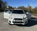 Белый Мицубиси Outlander Sport, объемом двигателя 2 л и пробегом 255 тыс. км за 12000 $, фото 6 на Automoto.ua