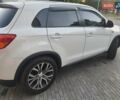 Белый Мицубиси Outlander Sport, объемом двигателя 2 л и пробегом 206 тыс. км за 9000 $, фото 6 на Automoto.ua
