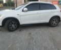 Белый Мицубиси Outlander Sport, объемом двигателя 2 л и пробегом 206 тыс. км за 9000 $, фото 3 на Automoto.ua