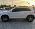 Білий Міцубісі Outlander Sport, об'ємом двигуна 2.4 л та пробігом 98 тис. км за 12850 $, фото 6 на Automoto.ua