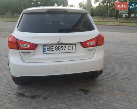 Белый Мицубиси Outlander Sport, объемом двигателя 2 л и пробегом 206 тыс. км за 9000 $, фото 1 на Automoto.ua