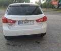 Белый Мицубиси Outlander Sport, объемом двигателя 2 л и пробегом 206 тыс. км за 9000 $, фото 1 на Automoto.ua