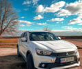 Белый Мицубиси Outlander Sport, объемом двигателя 2.4 л и пробегом 270 тыс. км за 14399 $, фото 1 на Automoto.ua