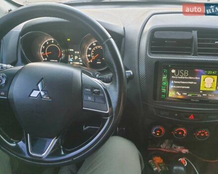 Белый Мицубиси Outlander Sport, объемом двигателя 2 л и пробегом 206 тыс. км за 9000 $, фото 9 на Automoto.ua