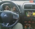 Белый Мицубиси Outlander Sport, объемом двигателя 2 л и пробегом 206 тыс. км за 9000 $, фото 9 на Automoto.ua