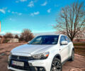 Белый Мицубиси Outlander Sport, объемом двигателя 2.4 л и пробегом 270 тыс. км за 14399 $, фото 1 на Automoto.ua