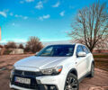 Белый Мицубиси Outlander Sport, объемом двигателя 2.4 л и пробегом 270 тыс. км за 14999 $, фото 1 на Automoto.ua