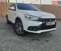 Белый Мицубиси Outlander Sport, объемом двигателя 2 л и пробегом 206 тыс. км за 9000 $, фото 2 на Automoto.ua