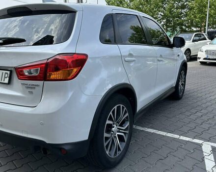 Белый Мицубиси Outlander Sport, объемом двигателя 2.36 л и пробегом 123 тыс. км за 10500 $, фото 6 на Automoto.ua