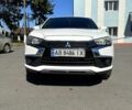 Белый Мицубиси Outlander Sport, объемом двигателя 2 л и пробегом 110 тыс. км за 12600 $, фото 1 на Automoto.ua