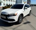 Белый Мицубиси Outlander Sport, объемом двигателя 2 л и пробегом 110 тыс. км за 12600 $, фото 2 на Automoto.ua