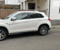 Белый Мицубиси Outlander Sport, объемом двигателя 2 л и пробегом 110 тыс. км за 13800 $, фото 4 на Automoto.ua