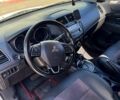 Белый Мицубиси Outlander Sport, объемом двигателя 2 л и пробегом 110 тыс. км за 12600 $, фото 6 на Automoto.ua