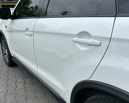 Белый Мицубиси Outlander Sport, объемом двигателя 2.36 л и пробегом 123 тыс. км за 10500 $, фото 9 на Automoto.ua