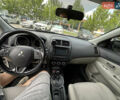 Белый Мицубиси Outlander Sport, объемом двигателя 2.36 л и пробегом 123 тыс. км за 10500 $, фото 11 на Automoto.ua