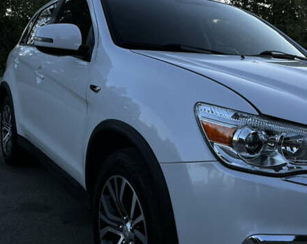 Білий Міцубісі Outlander Sport, об'ємом двигуна 2 л та пробігом 77 тис. км за 14000 $, фото 10 на Automoto.ua