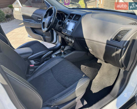 Белый Мицубиси Outlander Sport, объемом двигателя 2 л и пробегом 144 тыс. км за 16400 $, фото 21 на Automoto.ua