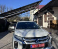 Белый Мицубиси Outlander Sport, объемом двигателя 2 л и пробегом 144 тыс. км за 16400 $, фото 2 на Automoto.ua