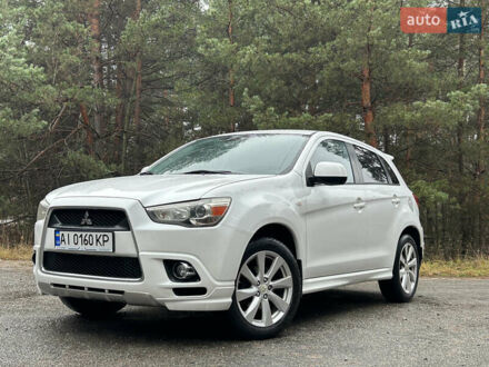 Белый Мицубиси Outlander Sport, объемом двигателя 2 л и пробегом 260 тыс. км за 8999 $, фото 1 на Automoto.ua