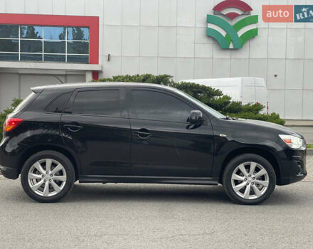 Черный Мицубиси Outlander Sport, объемом двигателя 2 л и пробегом 205 тыс. км за 10750 $, фото 7 на Automoto.ua