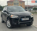 Черный Мицубиси Outlander Sport, объемом двигателя 2 л и пробегом 205 тыс. км за 10750 $, фото 1 на Automoto.ua