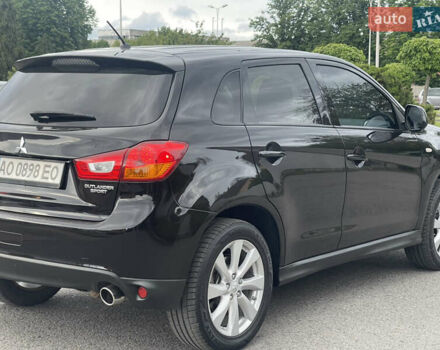 Черный Мицубиси Outlander Sport, объемом двигателя 2 л и пробегом 205 тыс. км за 10750 $, фото 8 на Automoto.ua