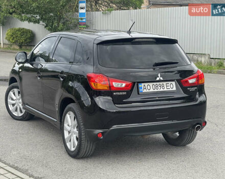 Черный Мицубиси Outlander Sport, объемом двигателя 2 л и пробегом 205 тыс. км за 10750 $, фото 2 на Automoto.ua