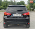 Черный Мицубиси Outlander Sport, объемом двигателя 2 л и пробегом 205 тыс. км за 10750 $, фото 6 на Automoto.ua