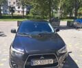 Черный Мицубиси Outlander Sport, объемом двигателя 2 л и пробегом 160 тыс. км за 11800 $, фото 15 на Automoto.ua