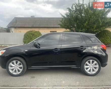 Черный Мицубиси Outlander Sport, объемом двигателя 2 л и пробегом 205 тыс. км за 10750 $, фото 5 на Automoto.ua