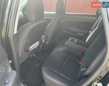 Черный Мицубиси Outlander Sport, объемом двигателя 2 л и пробегом 205 тыс. км за 10750 $, фото 14 на Automoto.ua