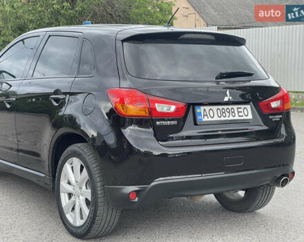 Черный Мицубиси Outlander Sport, объемом двигателя 2 л и пробегом 205 тыс. км за 10750 $, фото 9 на Automoto.ua