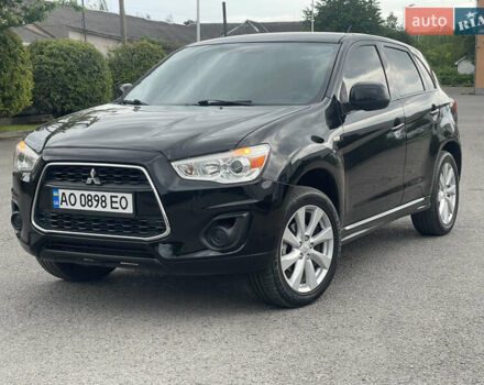 Черный Мицубиси Outlander Sport, объемом двигателя 2 л и пробегом 205 тыс. км за 10750 $, фото 1 на Automoto.ua